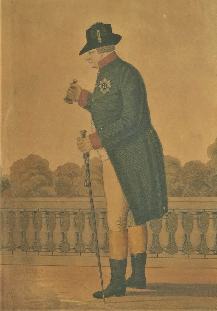 A coloured engraving of King George III (1738-1820) in profile. Created by engraver Joseph Constantine Sadler after artist C. Rosenberg and printed between 1807 and 1817 by Colnaghi & Co., London. It shows King George III in Windsor riding uniform holding a walking stick and ear trumpet.