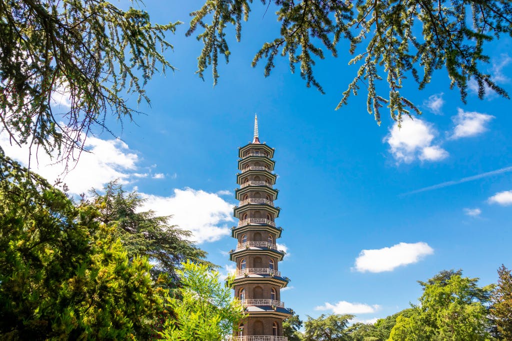 A tall, thin pagoda building with several platforms going up its height