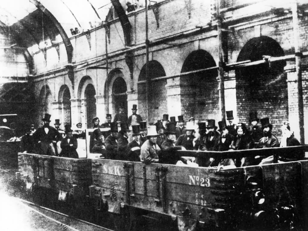 Photograph of people in the London Underground opening in January 1863 with a train about to leave Farringdon Station for Paddington