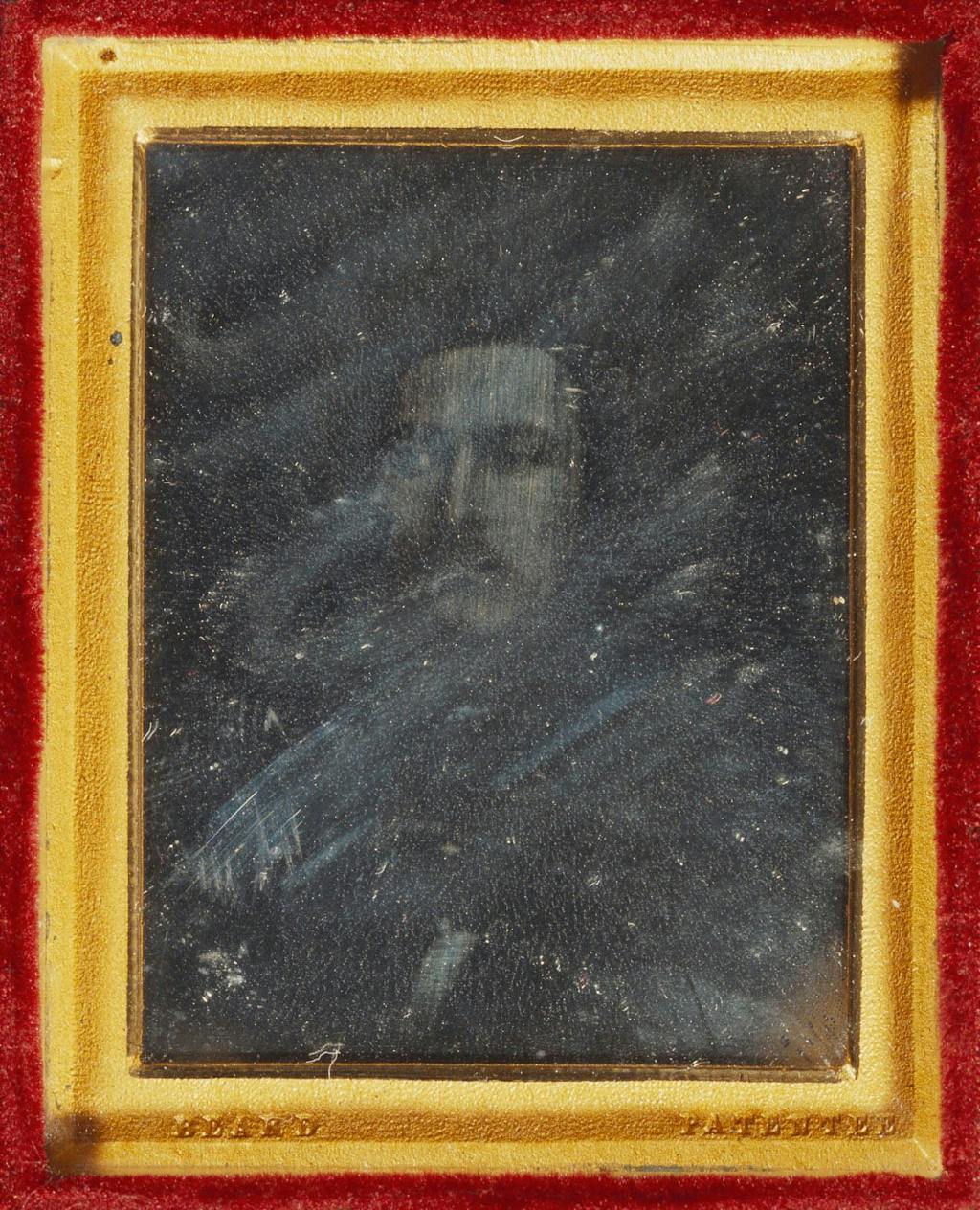 Prince Albert (1819-1861) by WILLIAM CONSTABLE (1783-1861)

Daguerreotype, showing a head-and-shoulders portrait of Prince Albert looking slightly to the left. The image has now faded considerably. The daguerreotype is mounted in a dark brown leather case with a red velvet interior. 'P. A. Feb 1842' is embossed on the lid in gold lettering and 'Beard Patented' is stamped beneath the daguerreotype.