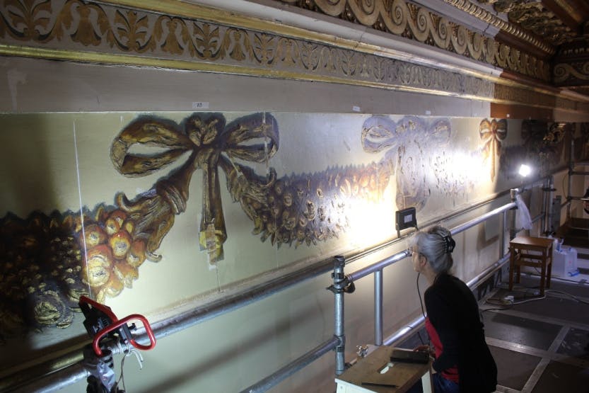 Banqueting Hall Wall Paintings conservation, showing Alexandra Kosinova (Art Restorations Conservator) recording the wall painting trials.