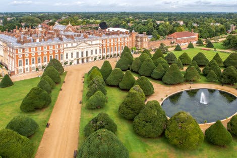 Aerial view of Great Fountain Garden at Hampton Court Palace showing Baroque East Front of palace